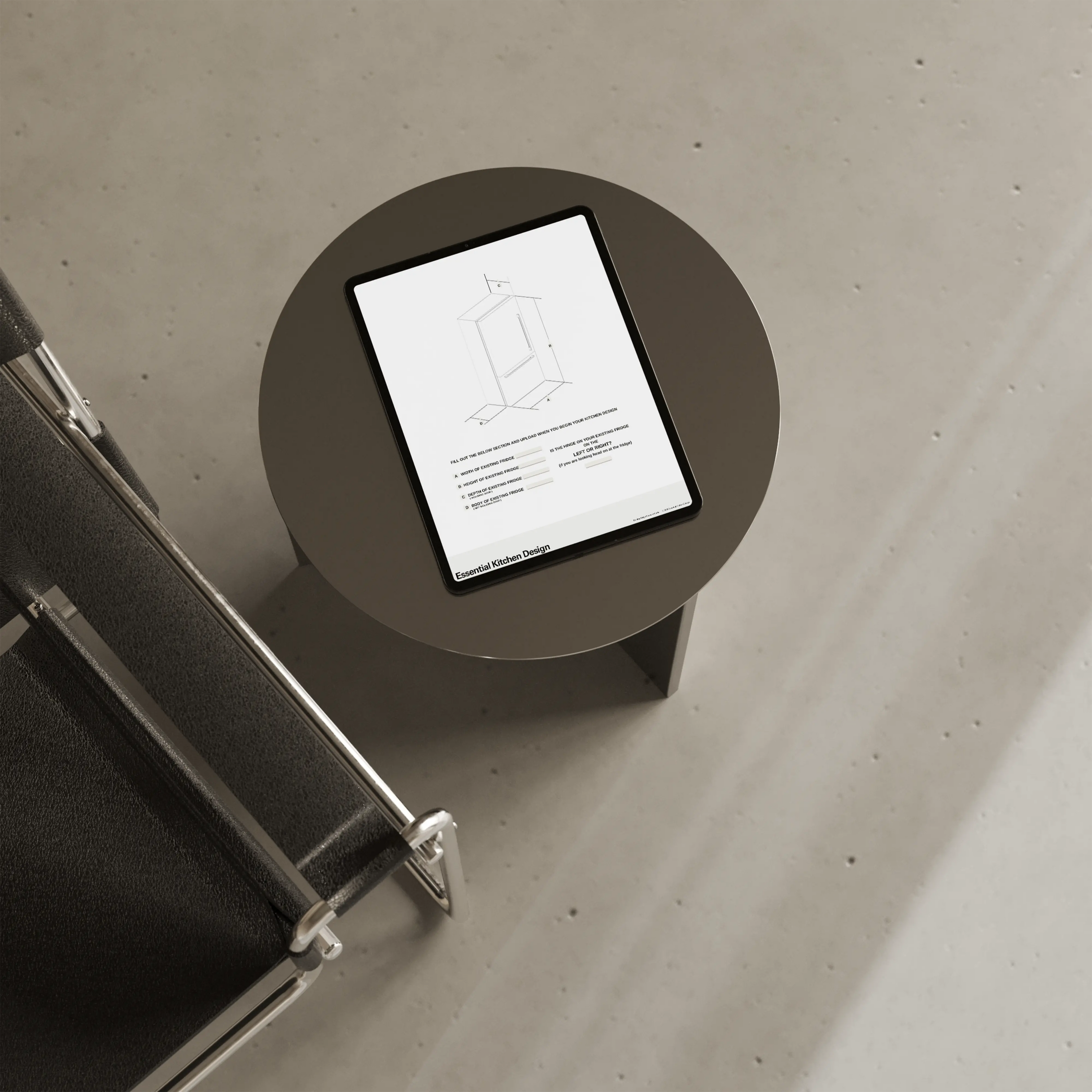 Tablet on a table displaying a sample form of the Existing Fridge Measuring Guide
